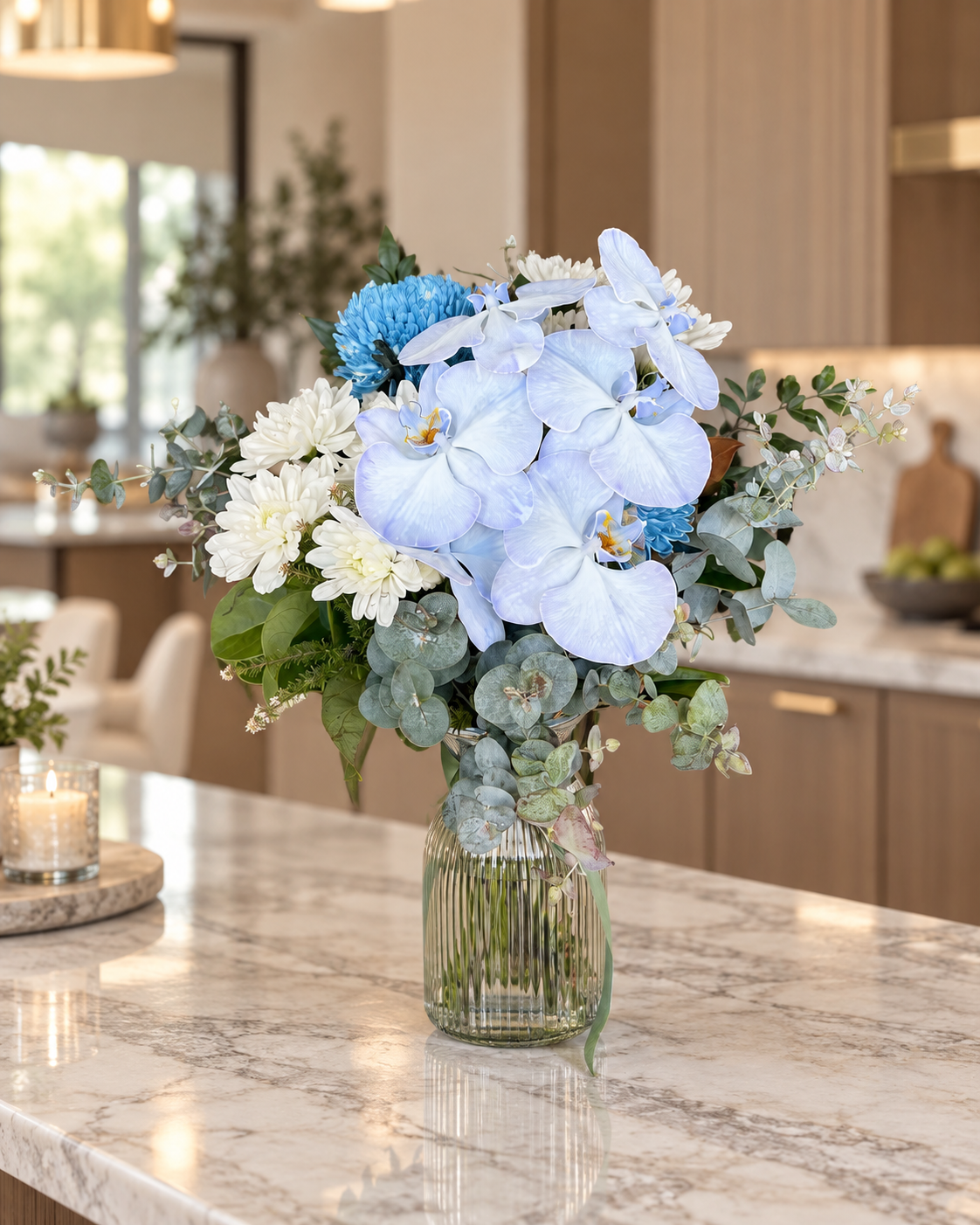 Blue orchid and chrysanthemum arrangement in a glass vase, by Abdo Florist Sydney