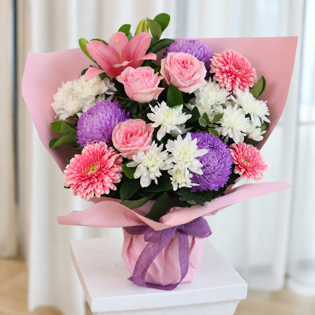 Pink, white and purple bouquet in blush paper, by Abdo Florist Sydney