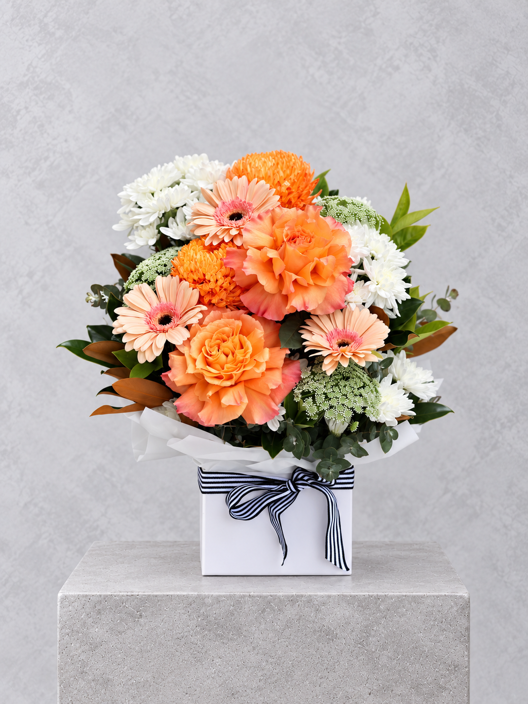 Peach and white flower arrangement in a gift box, by Abdo Florist Sydney