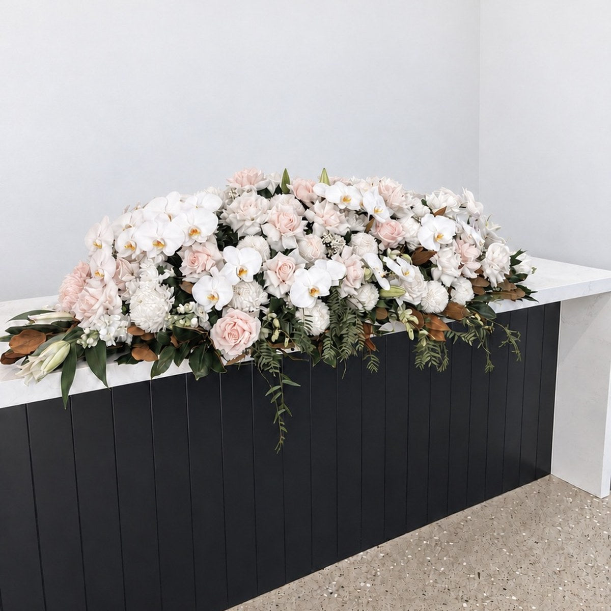 Blush Pink and White Orchid Casket Flowers – funeral casket spray by Abdo Florist Sydney
