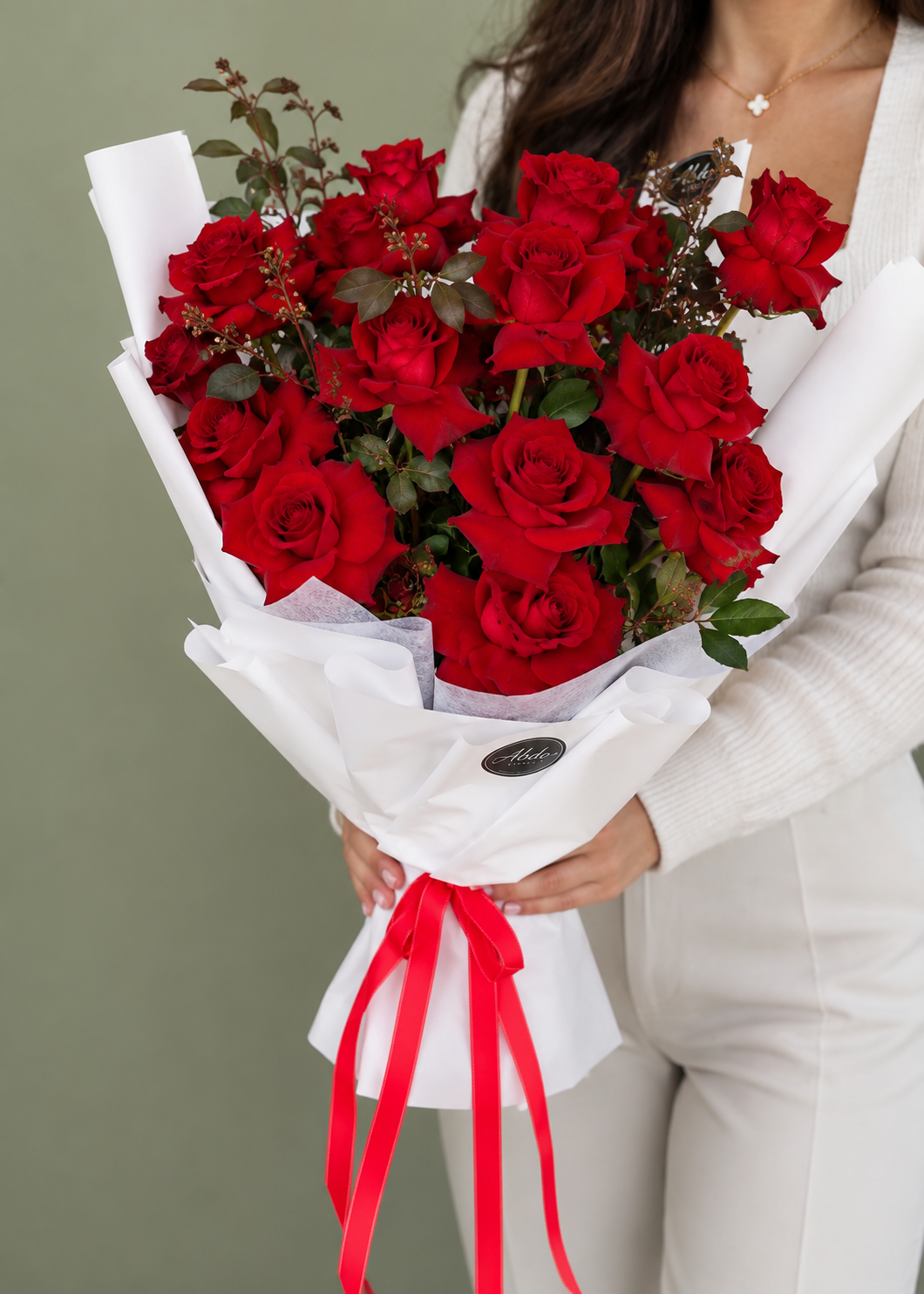 Dozen hand-flexed roses in red, white or pink, by Abdo Florist Sydney