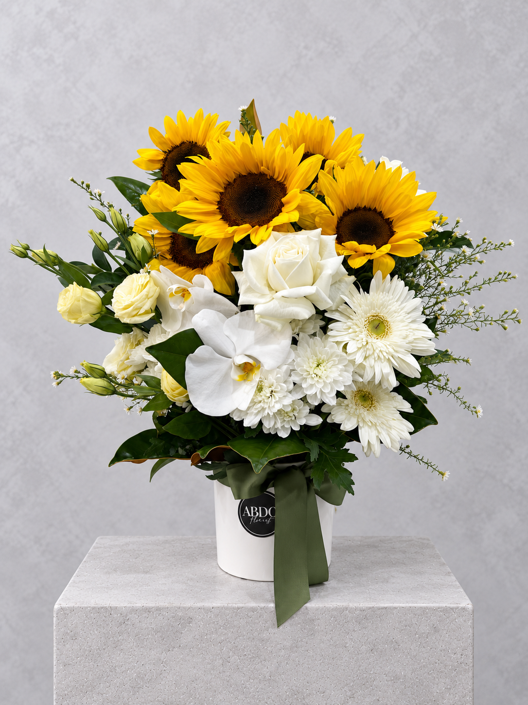 Sunflower and white bloom arrangement in a ceramic pot, by Abdo Florist Sydney