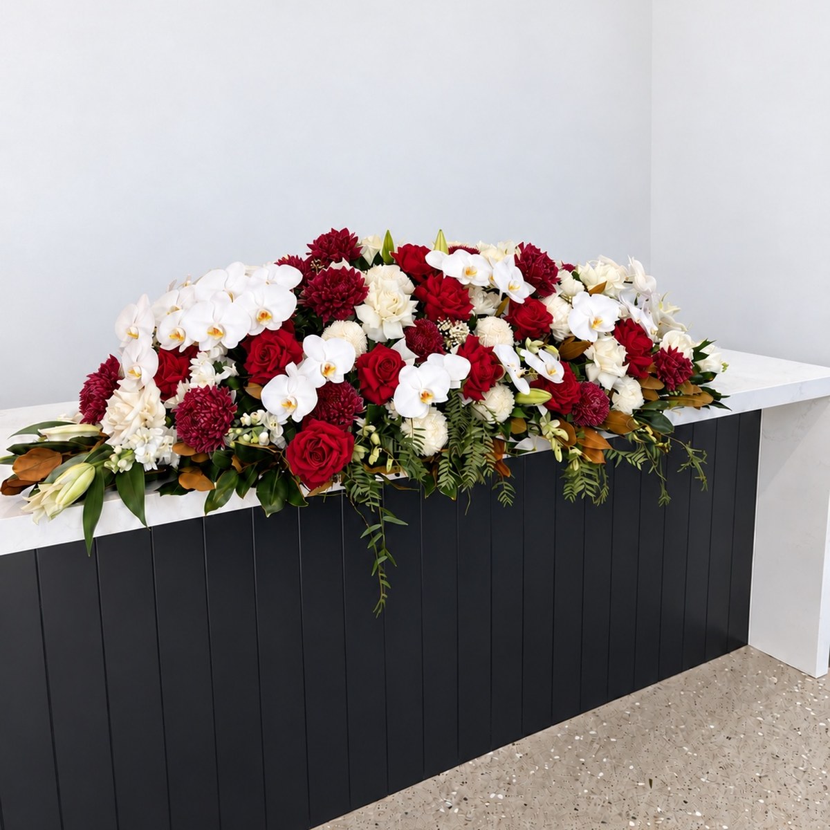 Red Rose and White Orchid Casket Flowers – funeral casket spray by Abdo Florist Sydney